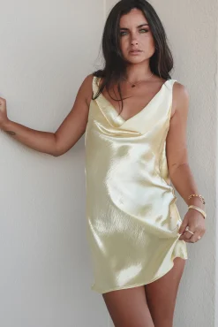 The Andie Anderson Yellow Satin Open Back Dress